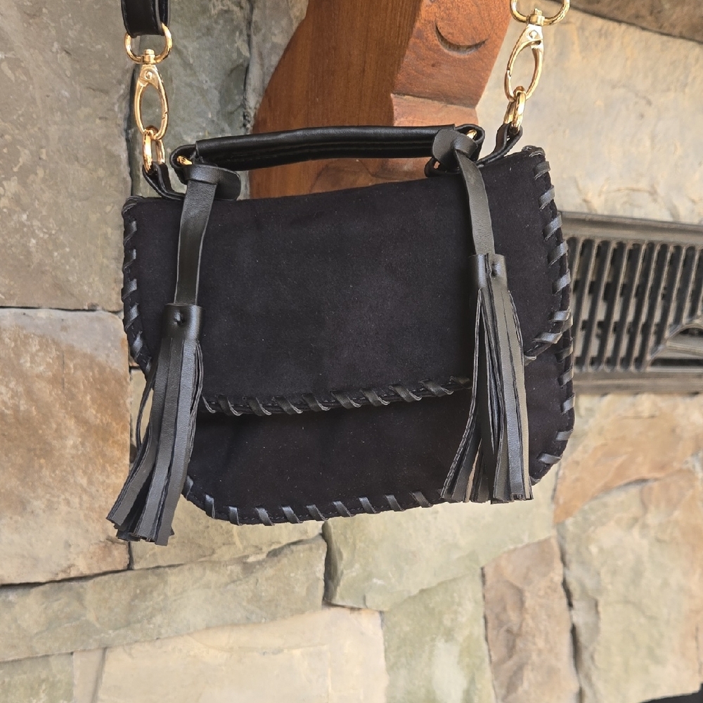 Stylish Black Crossbody Bag with Tassel Accents